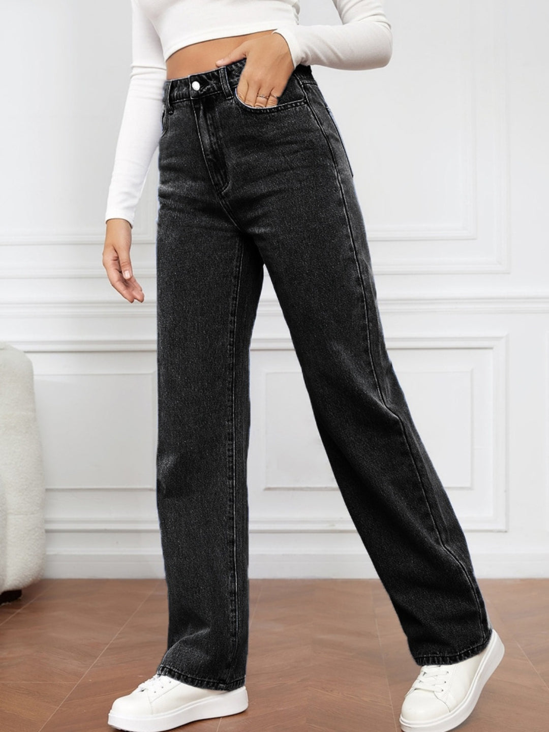 Women’s high waist straight jeans by Trendsi, showcasing a classic fit with a clean denim finish and front pockets.
